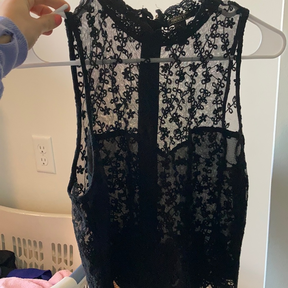 Lacy tank from forever 21. Perfect for nights out.